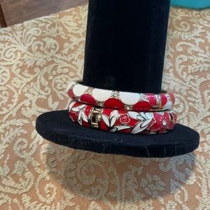 Two bracelets red, white and gold pattern.